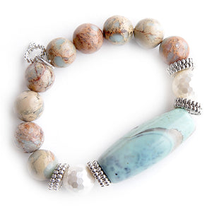 Seafoam agate barrel with mother of pearl accents on 12mm aqua terra jasper