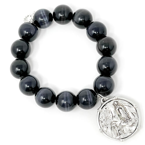 Black Pearl Calcite paired with a Private Collection Bezeled Lourdes Medal in