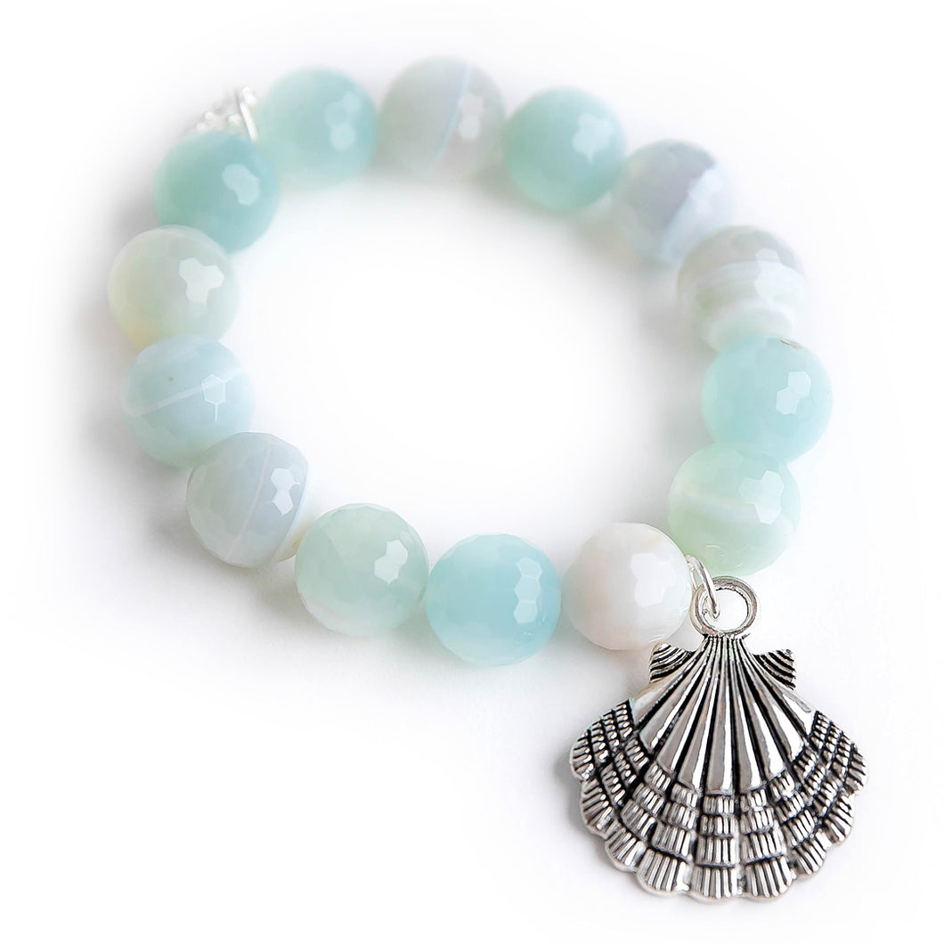 Faceted Caribbean Agate paired with a large silver Shell