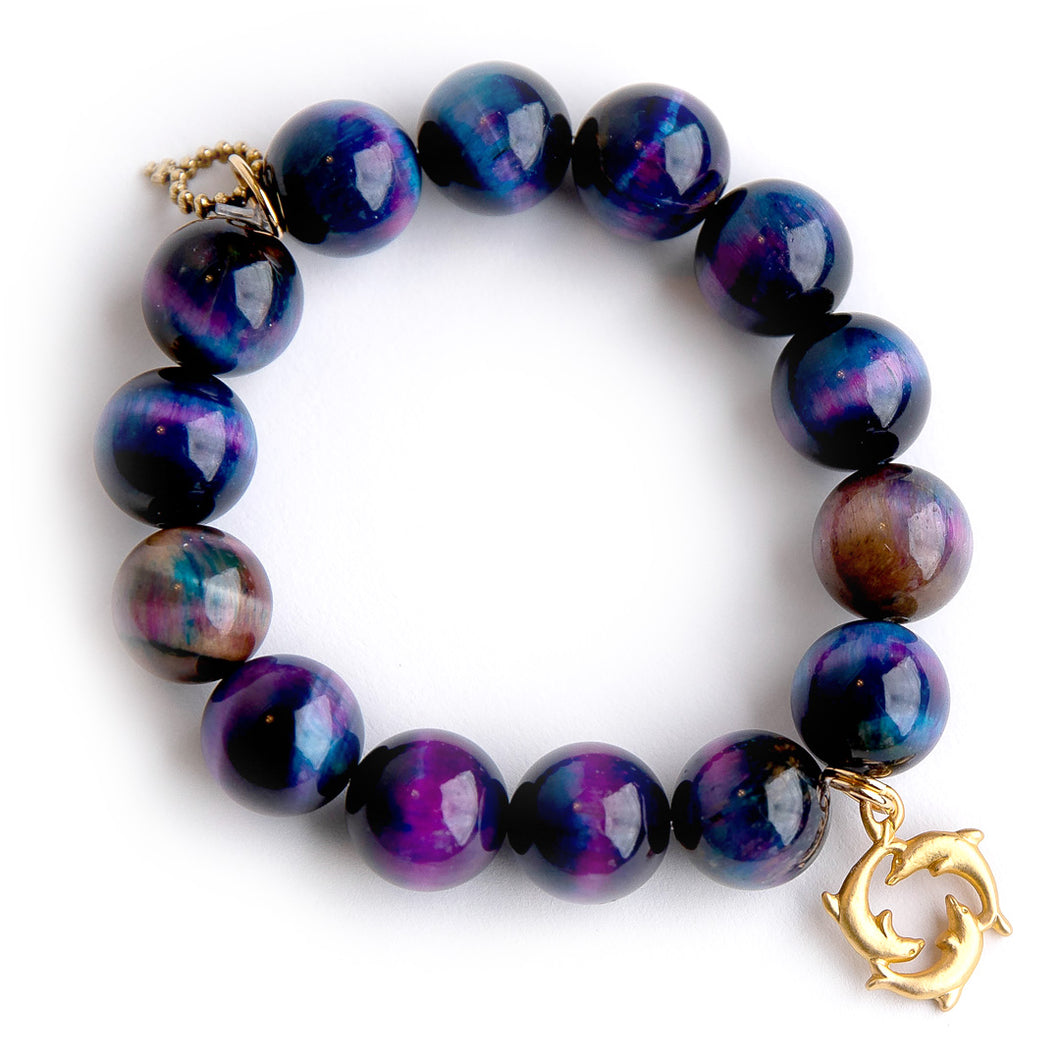 Northern Lights Tiger Eye paired with matte gold dancing dolphins