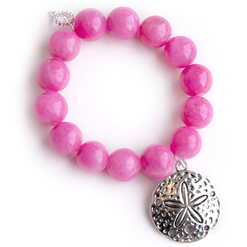 Pink Lady Agate paired with a large Silver Sand Dollar