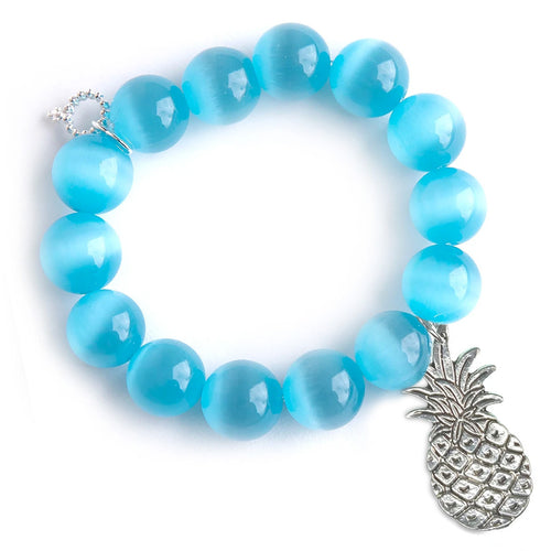 Tidal pool calcite paired with a silver pineapple
