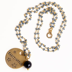 Blue quartz rosary chain necklace with navy goldstone accent and hand stamped bronze Sagittarius medal