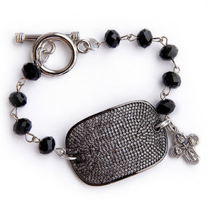 Faceted black onyx rosary chain with a gunmetal pave cuff and small silver cross