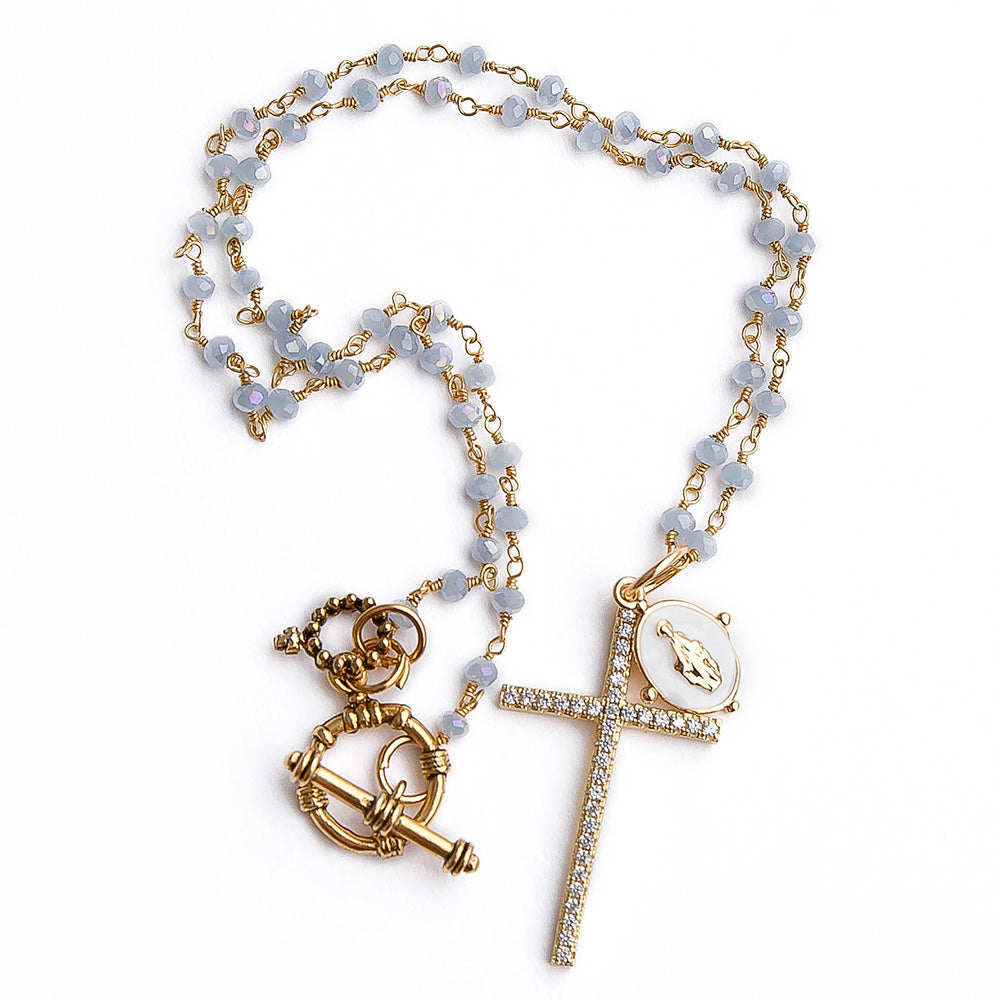 Faceted blue agate rosary chain with gold pave cross and white enameled mary