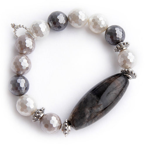 Faceted multicolor mother of pearl with umber barrel statement and silver accents